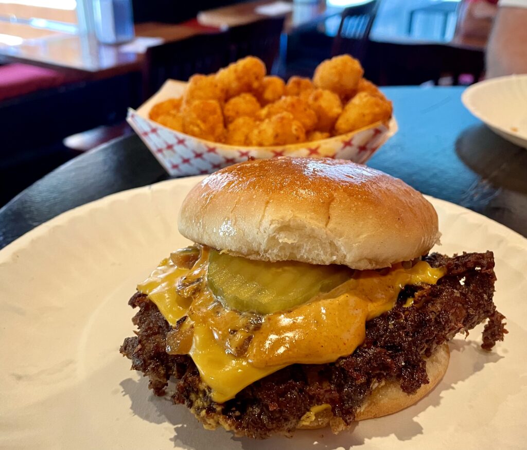 Gusto Burger — smashed patty with caramelized onions and signature sauce